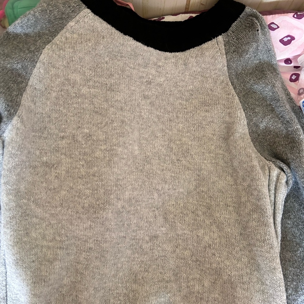 Cardigan sweater. Had for 3 months and never got worn.